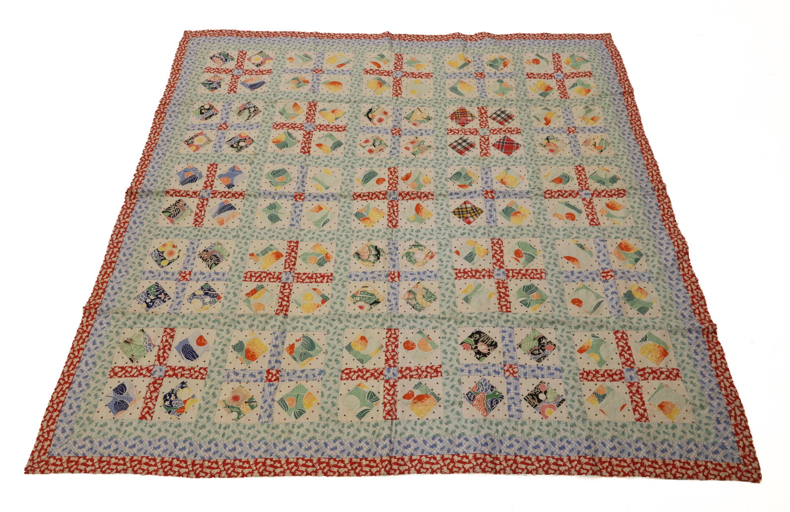 VINTAGE HAND STITCHED QUILT: COLORFUL QUILT W/ FEEDBAG MATERIAL PRINTED FABRICS. 67" X 68". MULTIPLE BORDERS. PRINTED BACK. PLEASE READ CAREFULLY - ITEMS MUST BE PAID FOR THROUGH LIVE AUCTIONEERS OR WITH CASH OR CHECK IN PERSON -