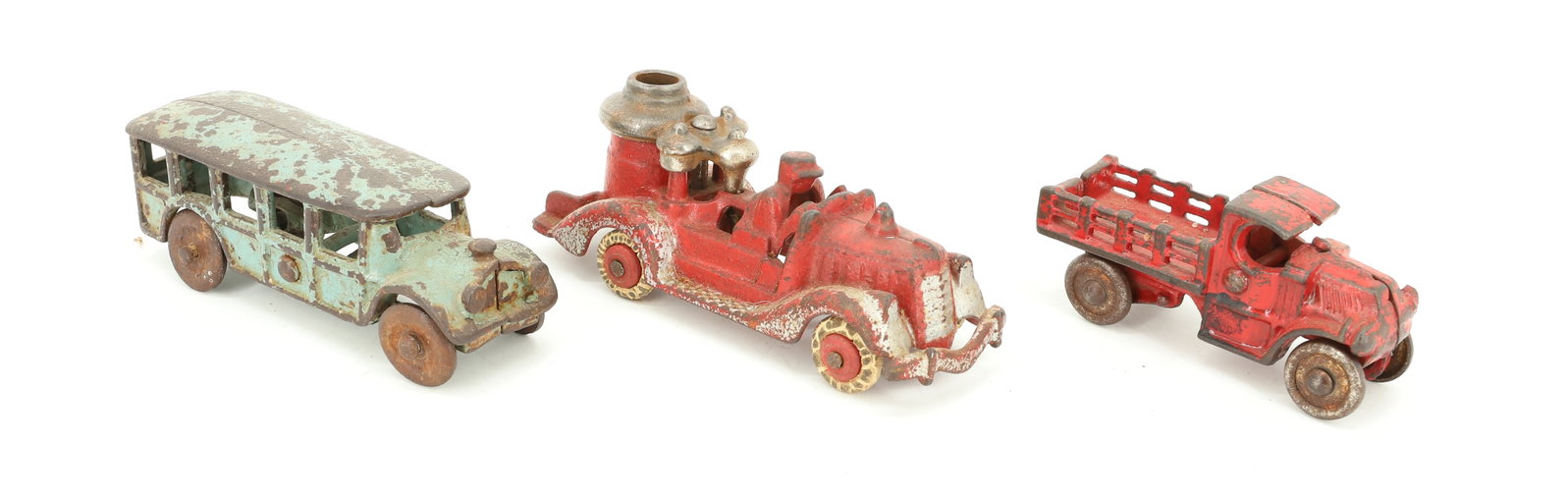 LOT OF (3) CAST IRON TOYS: INCLUDING: LIGHT BLUE BUS 4 5/8" L. PAINTED STAKE TRUCK 3 1/2". WITH, HUBLEY FIRE PUMPER TRUCK 4 3/4" L. (MRKD. ON BOTTOM). PLEASE READ CAREFULLY - ITEMS MUST BE PAID FOR THROUGH LIVE AUCTIONEERS OR