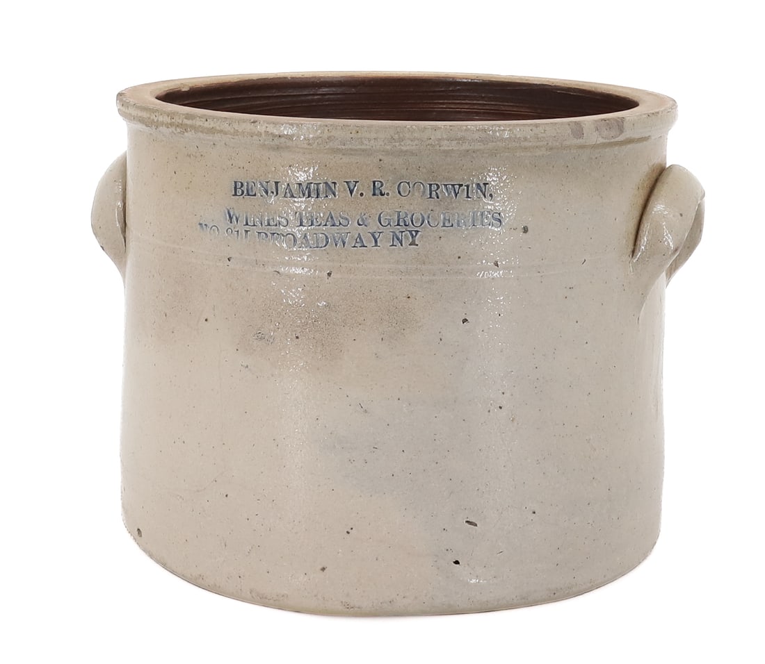 NEW YORK STONEWARE ADVERTISING CROCK: BENJAMIN V.R. CORWIN. WINES TEAS & GROCERIES NO 811 BROADWAY NY IMPRESSED AT TOP WITH BLUE WASH. 5 5/8" X 7 1/4". PLEASE READ CAREFULLY - ITEMS MUST BE PAID FOR THROUGH LIVE AUCTIONEERS OR WITH CASH