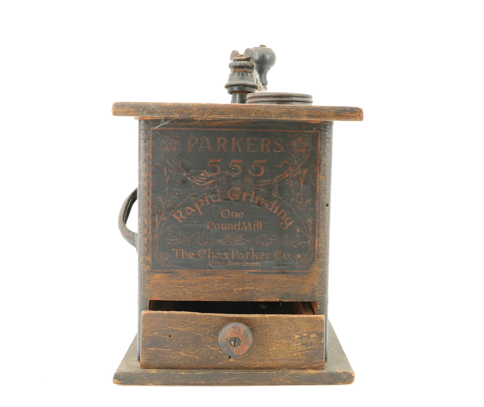 PARKERS 555 COFFEE GRINDER: WOODEN COFFEE MILL WITH ORIGINAL PAPER LABEL. DOVETAIL CONSTRUCTION. CAST IRON CRANK AND HANDLE. SINGLE DRAWER. 7 1/2" X 6 5/8" X 6 5/8". PLEASE READ CAREFULLY - ITEMS MUST BE PAID FOR THROUGH LIVE