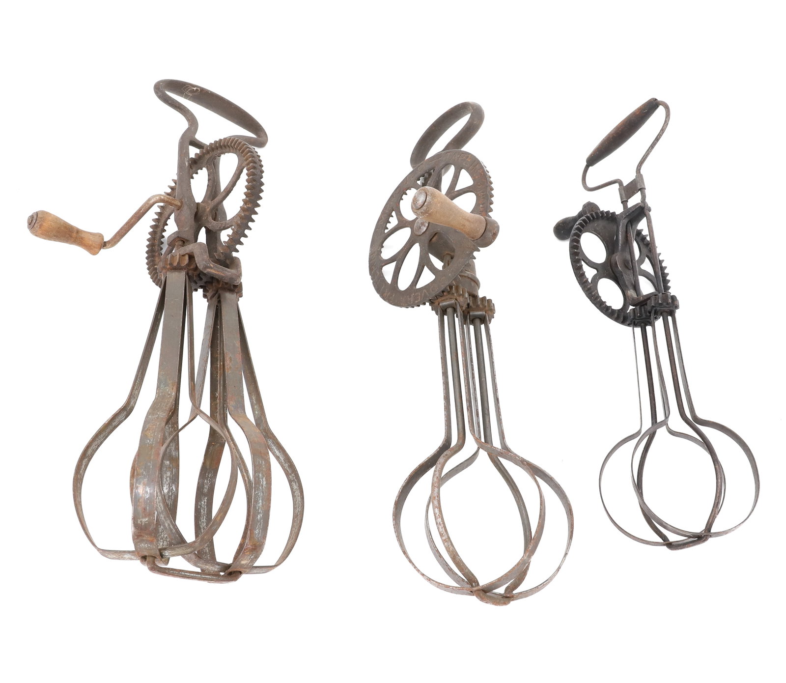 (3) ANTIQUE EGG BEATERS: INCLUDING: "THE TAPLIN MFG. CO....LIGHT RUNNING" 12 1/2" L. "TAPLIN'S DOVER PATTERN IMPROVED" 12 1/4" L. SMALLEST W/ WOODEN HAND GRIP AT TOP "JULY 14 '85" 10" L. PLEASE READ CAREFULLY - ITEMS MUST BE