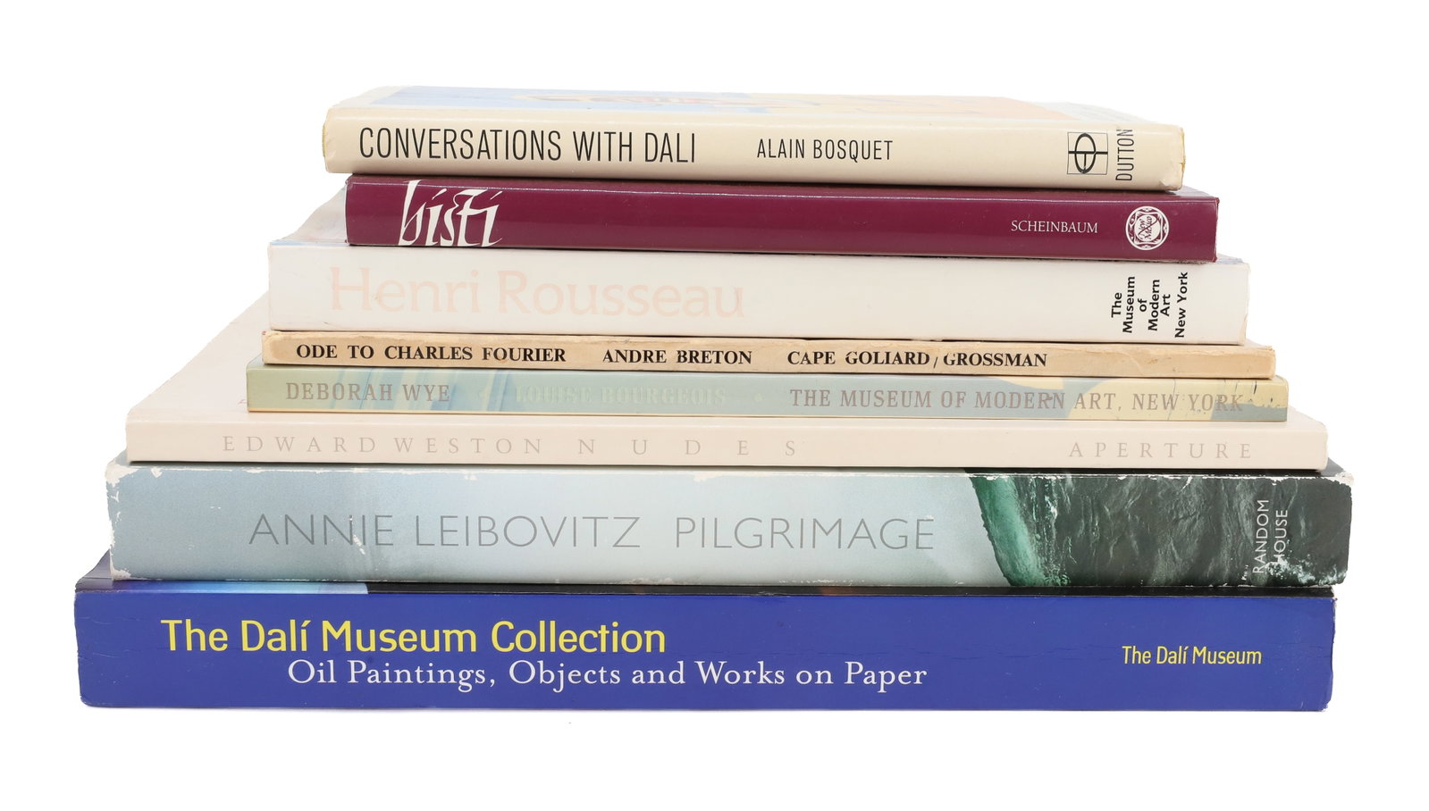 LOT OF ART BOOKS: (8) INCLUDING: CONVERSATIONS WITH DALI. BISTI. ODE TO CHARLES FOURIER. HENRI ROUSSEAU. LOUISE BOURGEOIS. EDWARD WESTON NUDES. ANNIE LEIBOVITZ, PILGRIMAGE. THE DALI MUSEUM COLLECTION. PLEASE READ CAREF