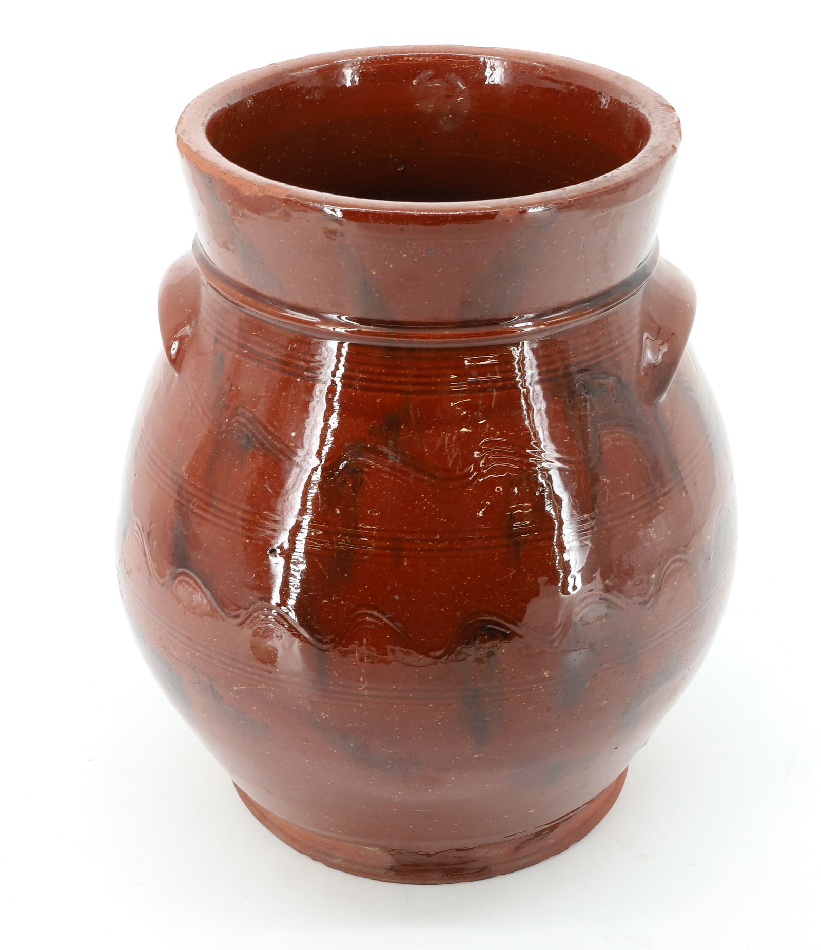 DECORATED REDWARE OVOID JAR: ORANGE GLAZE WITH BROWN SPLOTCHES AND INCISED BANDING AND WAVY LINES. 11" H. PLEASE READ CAREFULLY - ITEMS MUST BE PAID FOR THROUGH LIVE AUCTIONEERS OR WITH CASH OR CHECK IN PERSON - Terms for Purchas