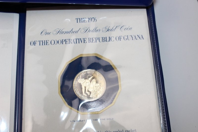 1976 GUYANA $100 GOLD: 5.74 GRAMS OF 500/100 GOLD 1976 GUYANA $100 GOLD COIN - THE FRANKLIN MINT