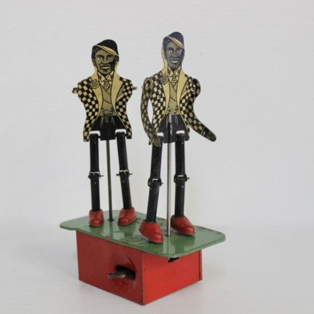 TIN LITHO JIGGER: MADE IN USA - PAT # 2072308 - TIN WIND-UP JIGGER 8"