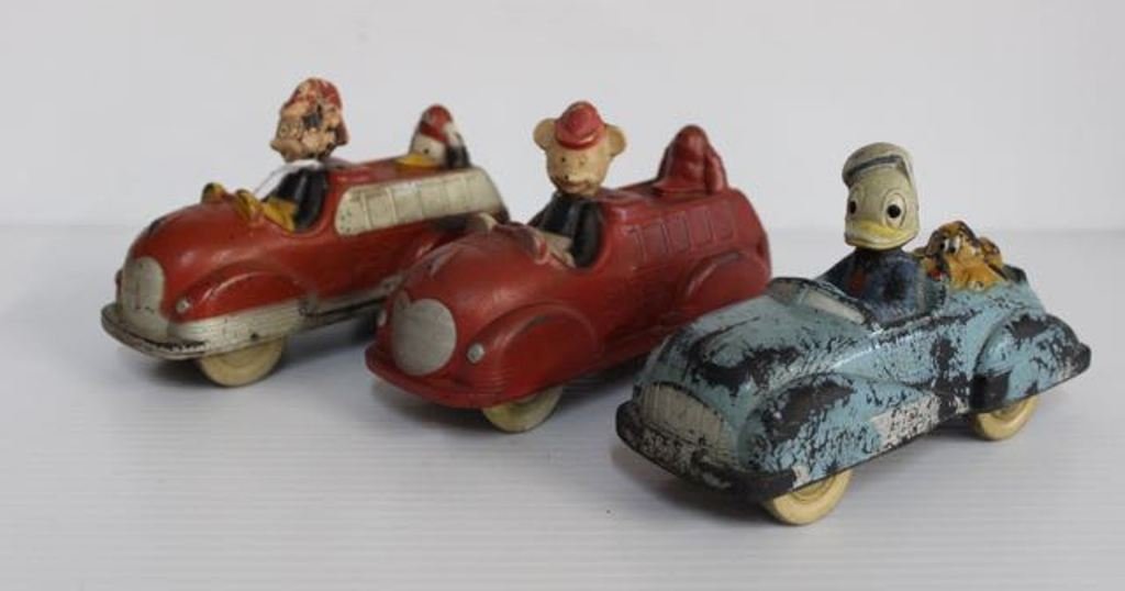 (3) DISNEY RUBBER CARS: MARKED THE SUN RUBBER CO. - MICKEY MOUSE, DONALD DUCK, AND PLUTO - FIRE TRUCKS AND CAR 6 1/4"