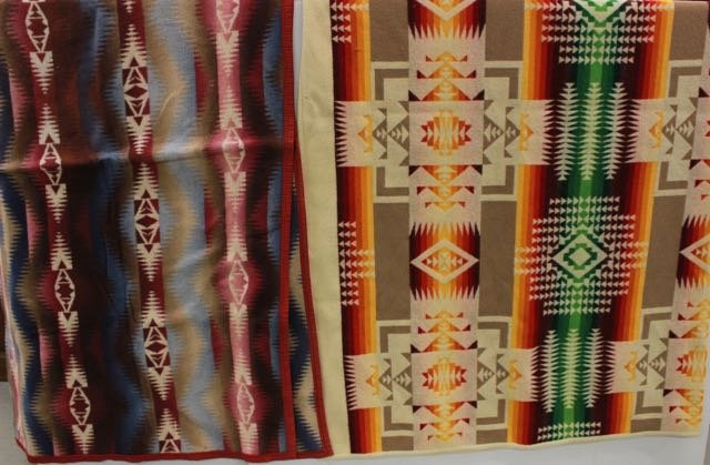 PAIR OF WOOL BLANKETS: PAIR OF WOOL BLANKETS WITH NATIVE AMERICAN DESIGN- ONE MARKED BEAVER STATE, PENDLETON.