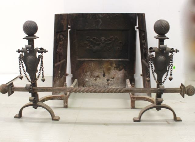 LT. 19TH CENTURY FIREPLACE SET: CAST IRON THREE SECTION FIREBACK WITH CHERUBS, ANDIRONS, AND CROSSBAR. 49" X 30"-FIREBACK 28"H-ANDIRONS 54"BAR