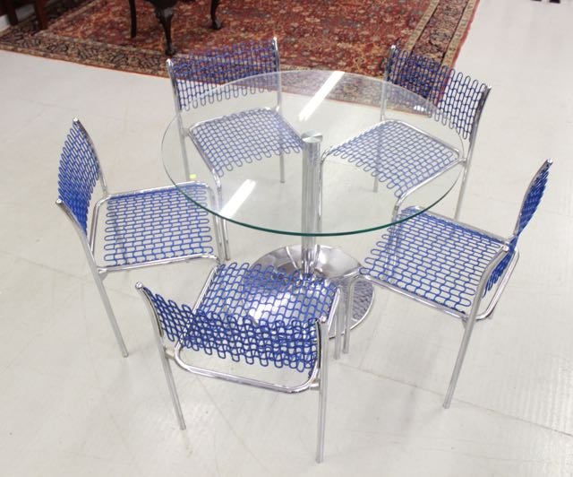 DESIGNER CHROME TABLE AND CHAIRS: MADE BY DAVID ROWLAND FOR THONET - CHROME TABLE BASE WITH SCREW IN GLASS TOP - 5 CHROME CHAIRS WITH BLUE WAFFLE DESIGN Dimensions:TABLE 39 1/2" X 30" - CHAIRS 30"x17"X17"