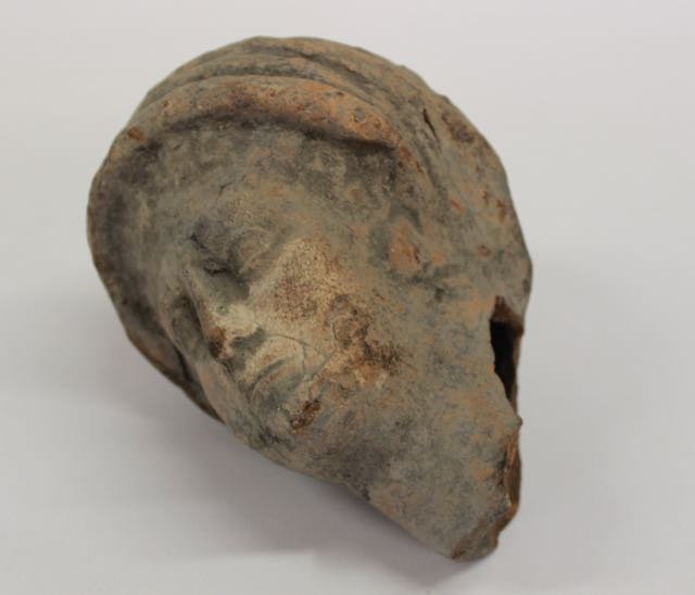 REDWARE HEAD ANTIQUITY: REDWARE HEAD - 14TH CENTURY - APPEARS TO HAVE BEEN DUG Dimensions:5 1/2" X 4 1/2"