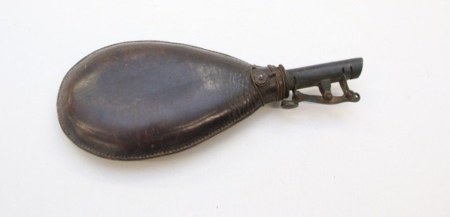 EARLY LEATHER SHOT FLASK: WITH SHOT PELLETS Dimensions: 8"