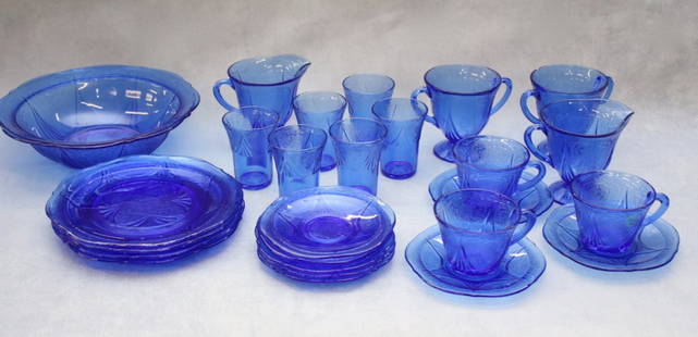 24 PC OF ROYAL LACE COBALT BLUE DEPRESSION GLASS LOT: (4) 8" PLATES; (3) 6" PLATES; (5) SAUCERS; (3) CUPS; (2) CREAMERS; (2) SUGARS; (1) 10 1/4" BOWL; (6) 3.5" JUICE GLASSES Dimensions: