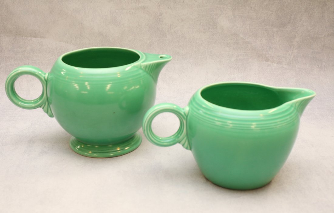 2 FIESTA PITCHERS: 1 LG. & 1 SM. GREEN PITCHER Dimensions: LG-5.25"SM.-4.25