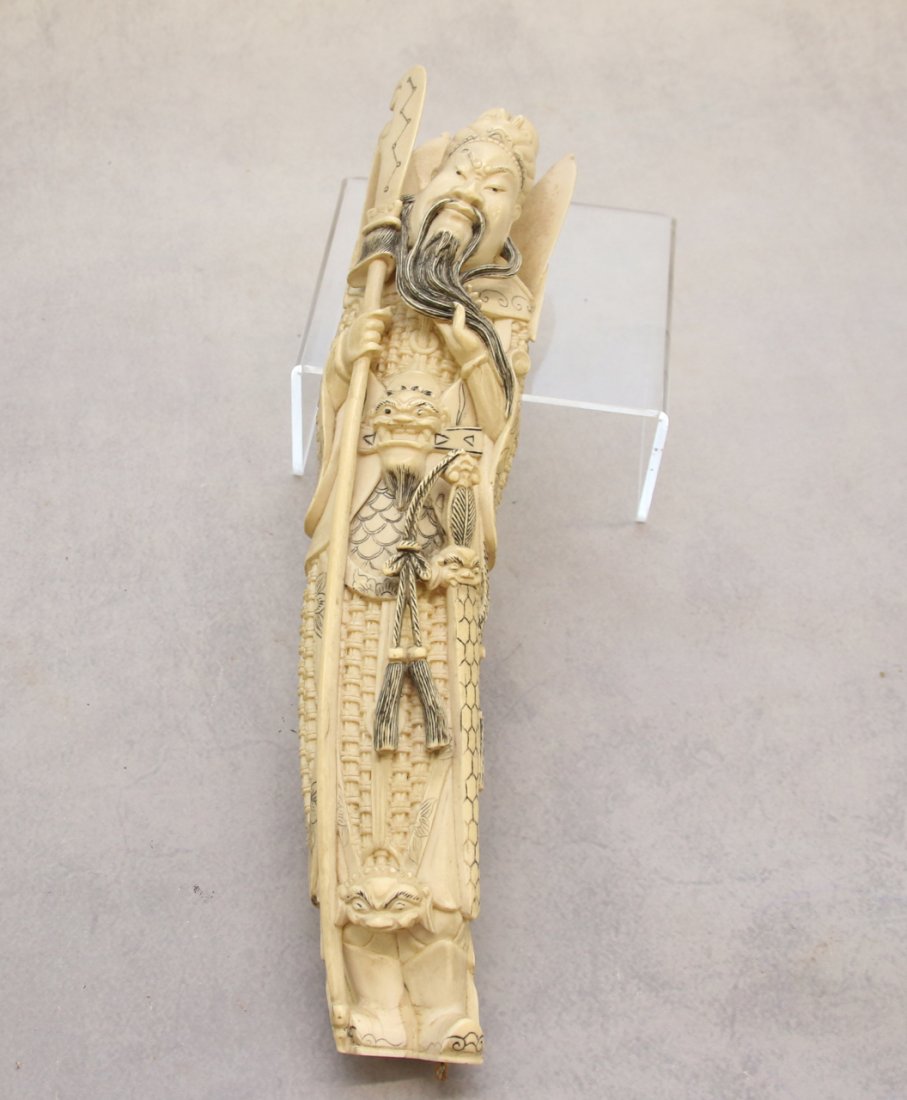 CARVED JAPANESE SAMURAI: BONE CARVED - WITH SWORD AND WEAPON 13" X 2 1/2"