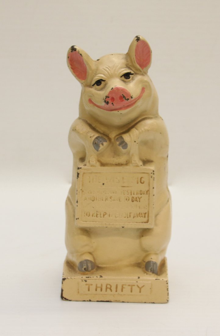 CAST IRON PIG STILL BANK (1 of 4)