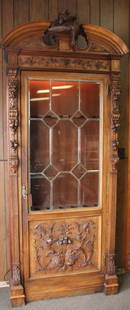 CARVED VICTORIAN GUN CASE: CIRCA 1880'S CARVED VICTORIAN GUN CABINET - ONE DOOR WITH BEVELED GLASS - 7 GUN SPOTS WITH SELVES Dimensions: 96" X 36" X 11.5"