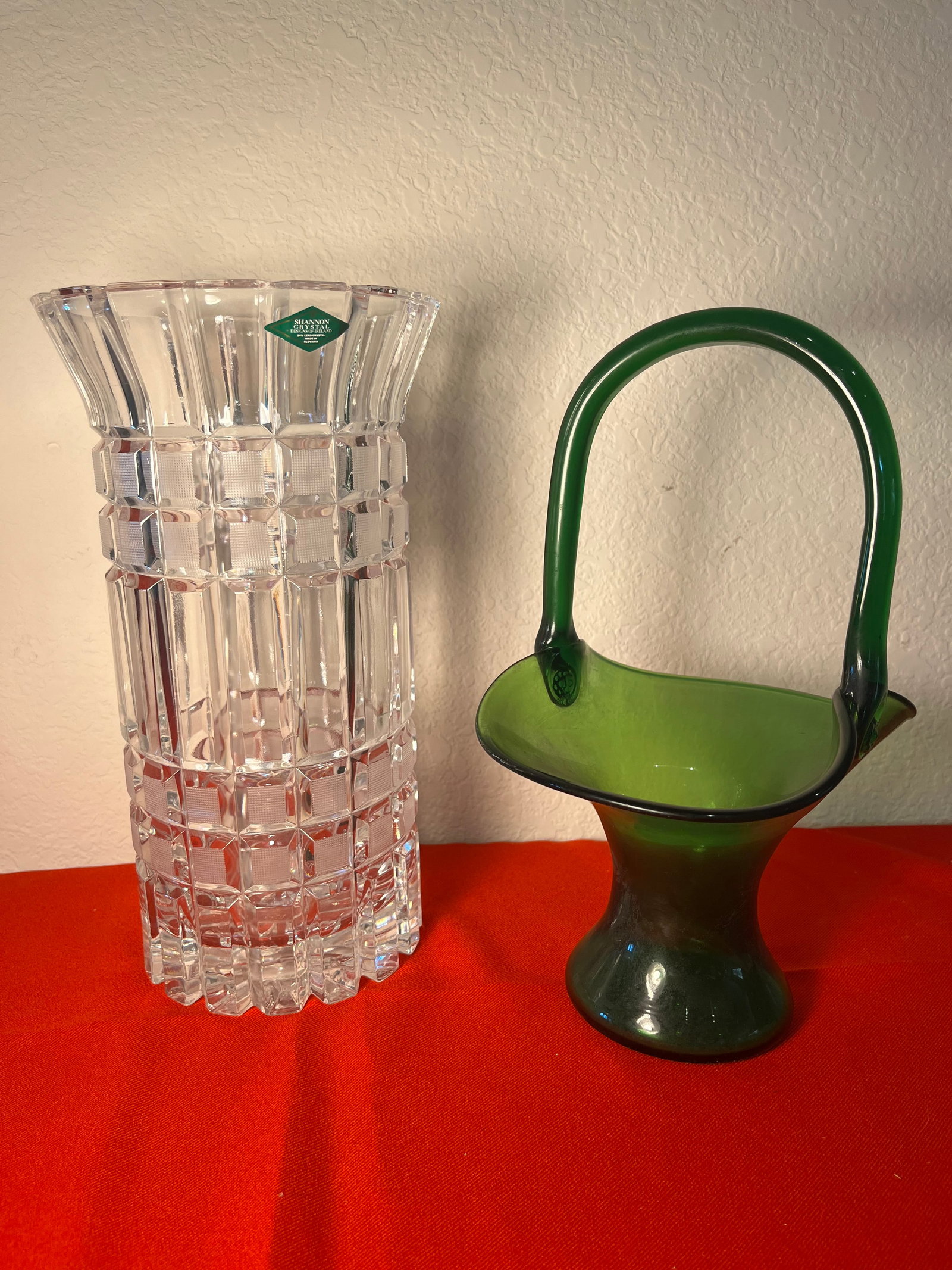 Emerald Green MCM Glass Basket & Crystal Vase: Crystal Vase is 24% Lead. Items in good shape. No damages. Basket has rough area on end of handlevase made in Slovakia.
