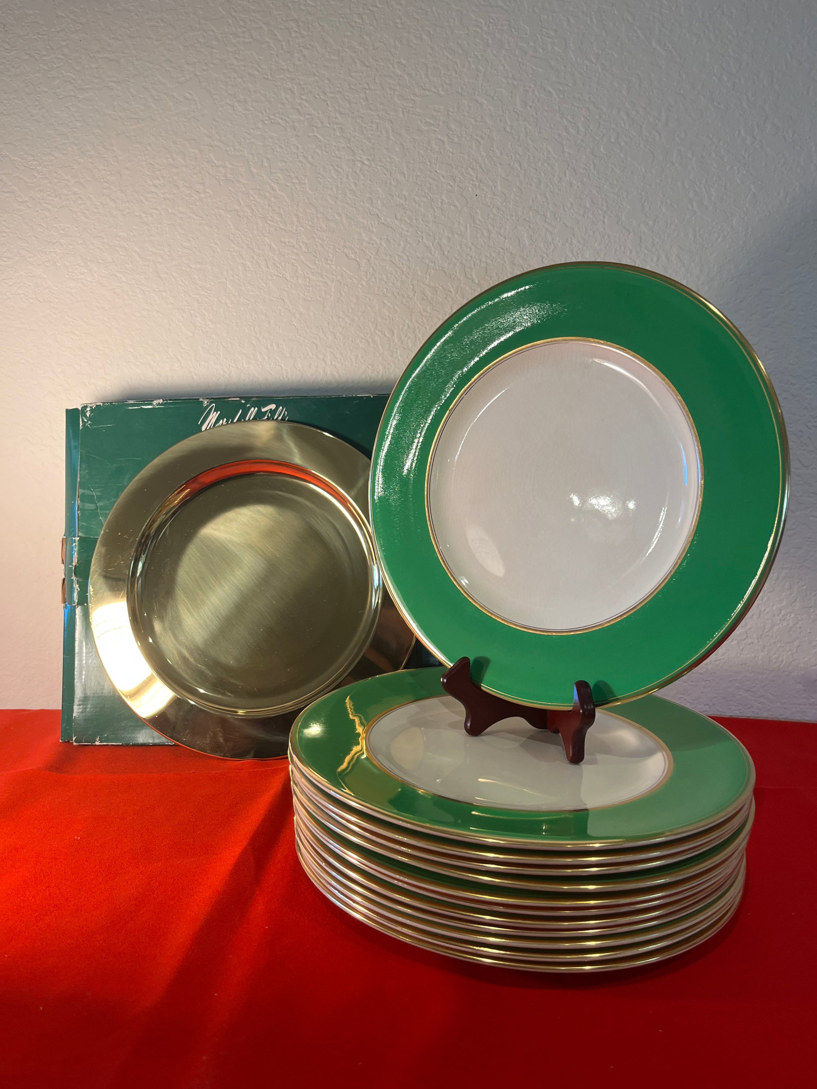 Fonde Ville England Charger Set, 12 Pieces: Ambassador Ware, Greenband with Gold Rim. 2 Sets of 11 3/4 Sold Brass Charger Plates. 4 in each box