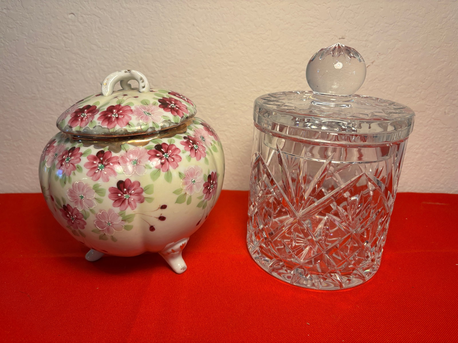 Crystal Biscuit Jar and Porcelain Ginger Jar: Unmaked Crystal Lidded Jar, very heavy. No damages. Porcelain lidded ginger jar unmarked. Hairline cracks in jar from age. Natural crack in lid.