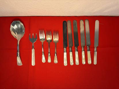 Silver plate, Abalone, and Luctie Dinnerware, 11 Pieces: Tarnished pieces. 6 Knives by Landers, Frary, & Clark. 3 Forks unmarked, 1 cracked handle. 1 ServingSpoon unmarked. 1 Lucite Handle Fork made in England. Marked EPNS