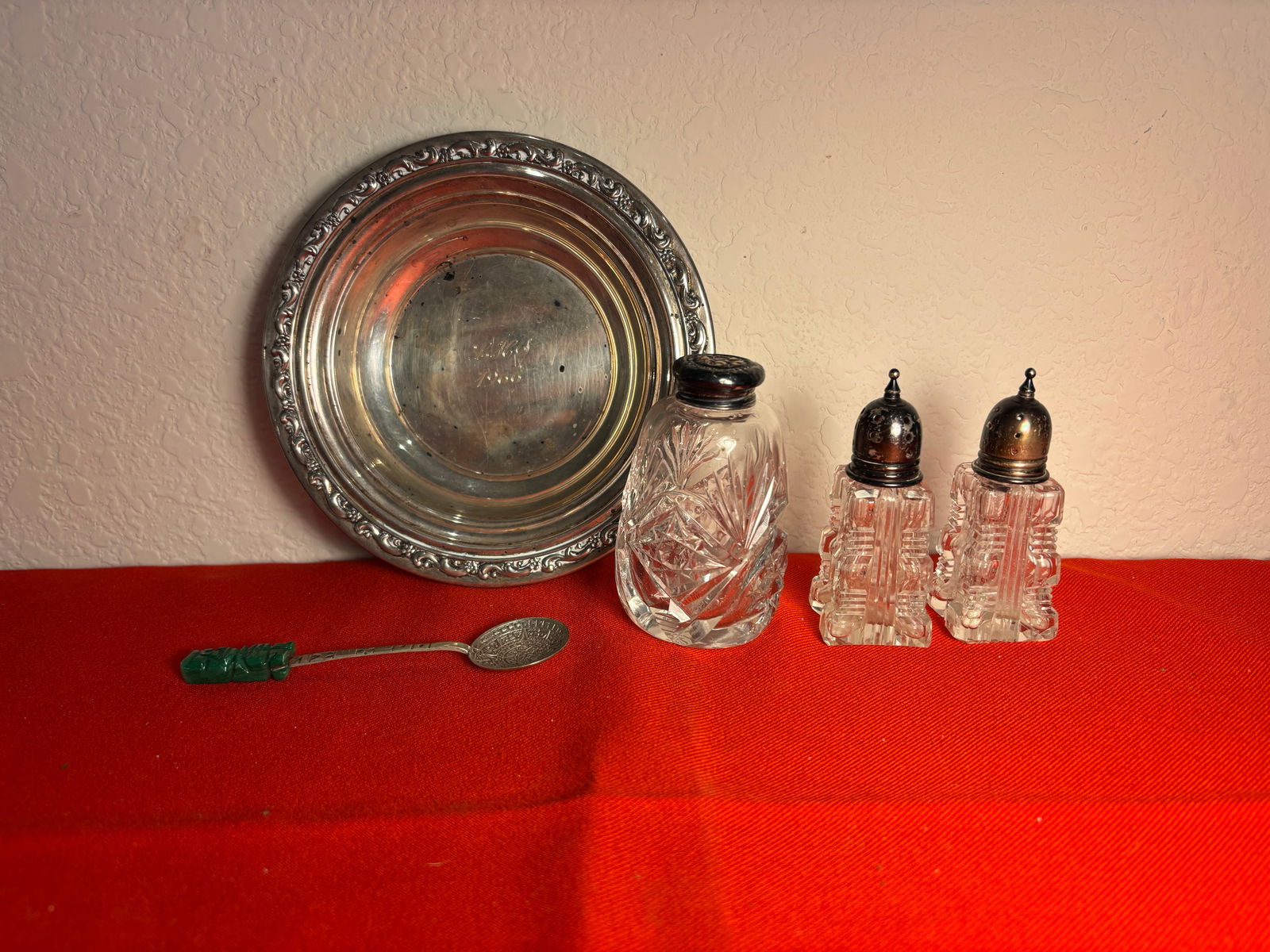 Sterling & Crystal Lot: Bowl engraved LHDS 1966. Reede & Barton sterling. Has discolorations. Salt and Pepper Shakers.Sterling Lods. Tarnished. 1 single shaker with sterling lid. 1 Sterling and malachite spoon - Mexico.No da