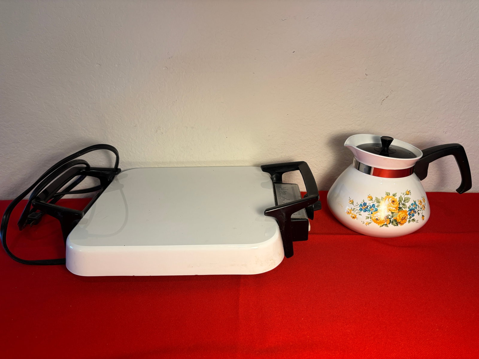 Corningware Skillet & Coffee Lot: Corning ware electric skillet. Needs a cleaning. No damages. Works well. Coffee pot also needscleaning. Bottom has scratches