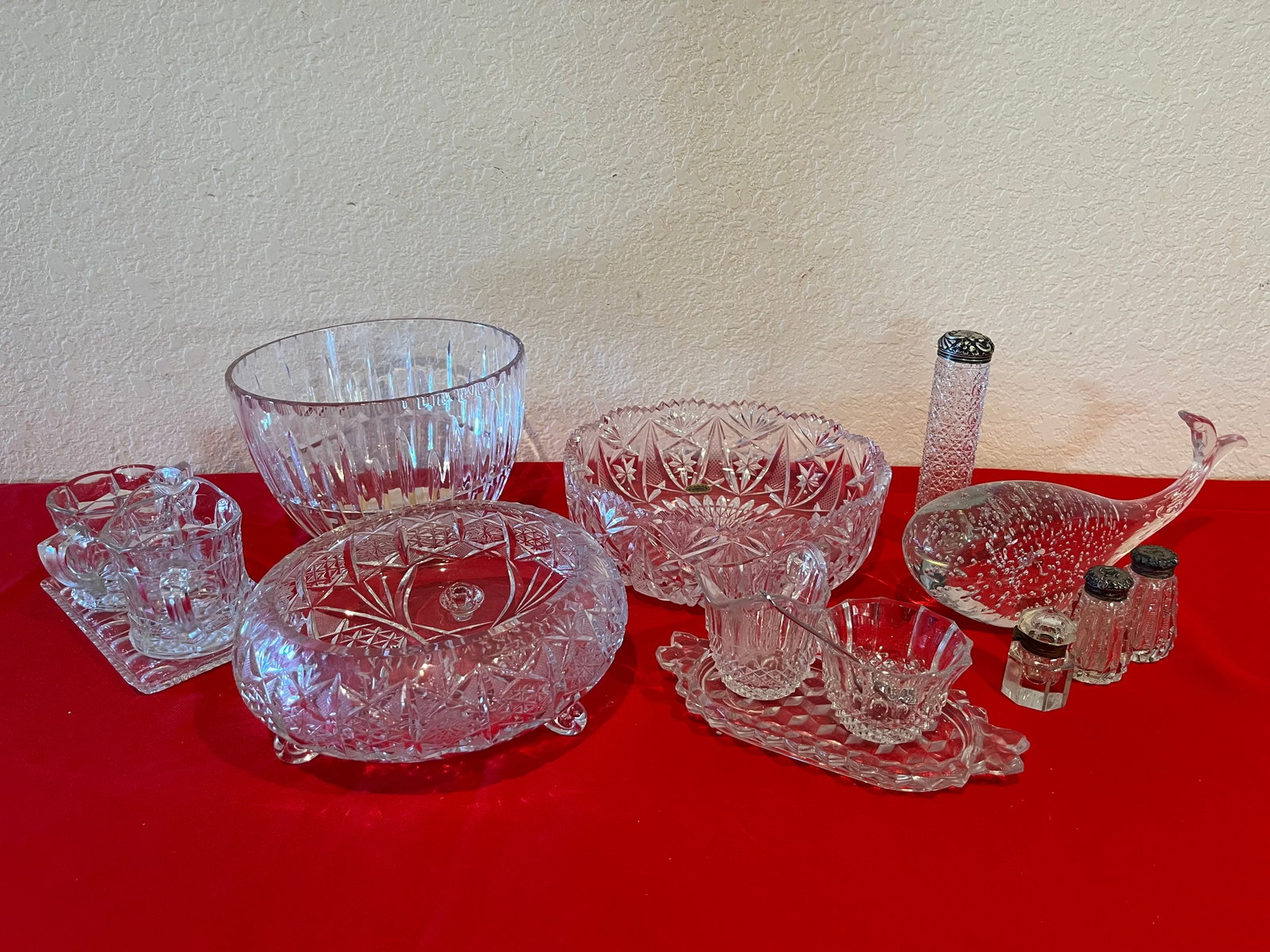 Lot of Crystal, 14 Pieces: Good condition. No obvious chips. Floral design. Bowls, candy dishes, salt and pepper shakers, cream and sugar, paper weights.