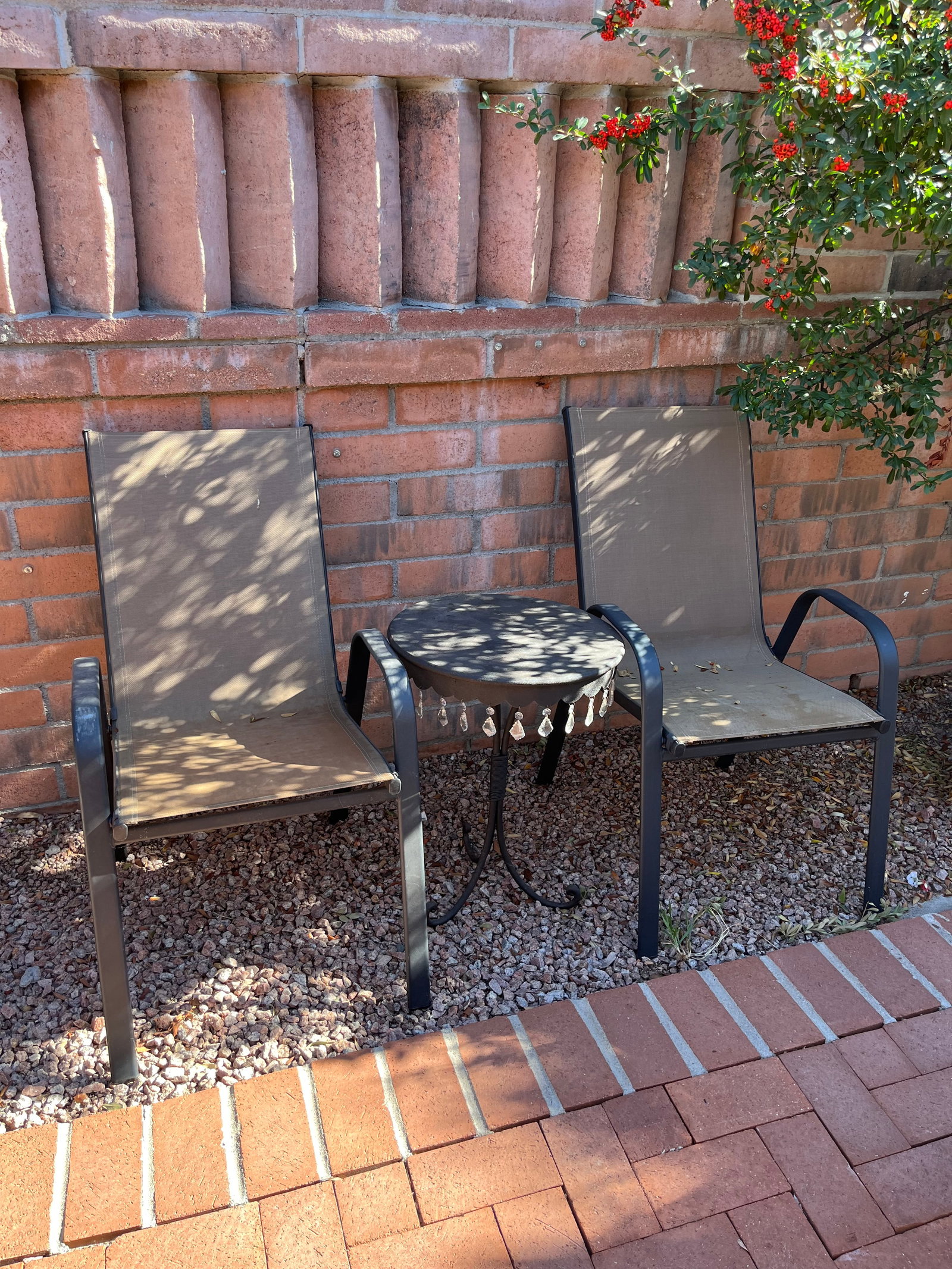 2 Patio Chairs and Side Table: Fabric and Metal. Slightly used. Seat Hight: 17.5"