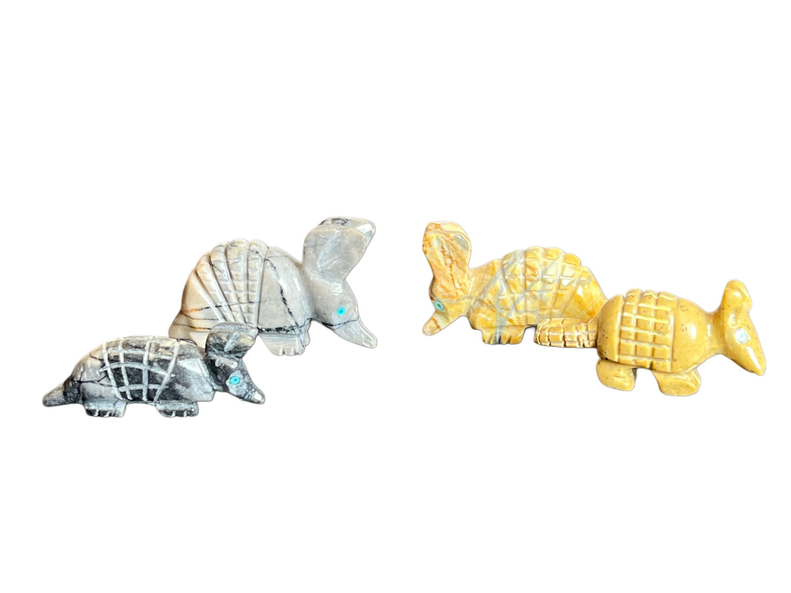 Zuni Fetish Lot of Armadillos and Beaver: Mae of picasso marble. All unsigned. All have turquoise inlay eyes. Good condition.