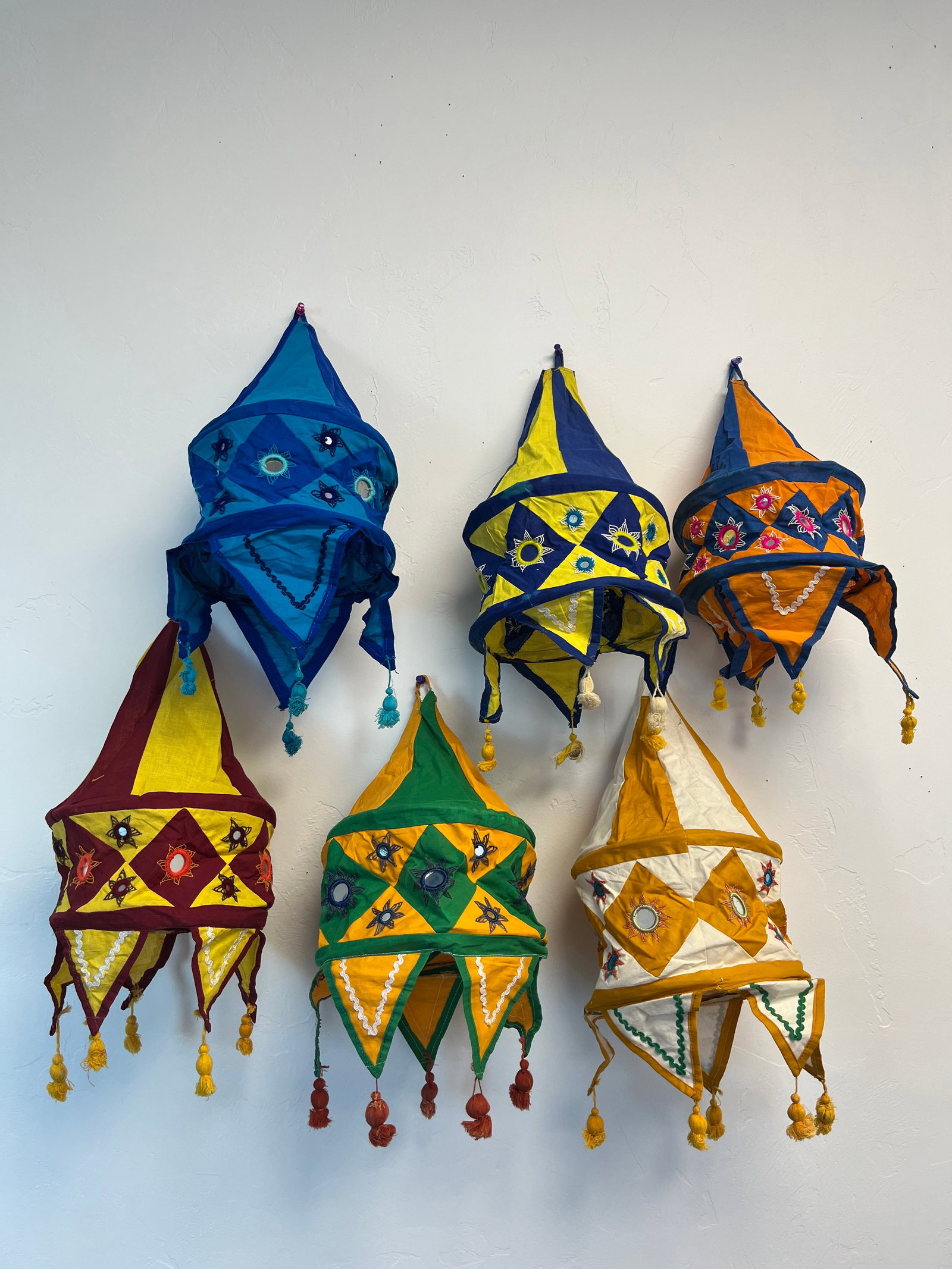 Lot of 6 Indian Lampshades: Slightly used conditions, mirror fraying and staining (See all photos), hand made, Vintage, Authentic, Dimensionsfolded up: 8" diameter. Open dimensions: 16" x 8" x 8". Multicolored