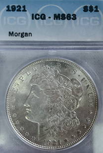 1921 Morgan Silver Dollar MS63: This 1921 Morgan Silver Dollar, minted in Philadelphia is rated MS63 and a valued addition to any collection.The Morgan Silver Dollar holds a special place in U.S. history as the first silver coin
