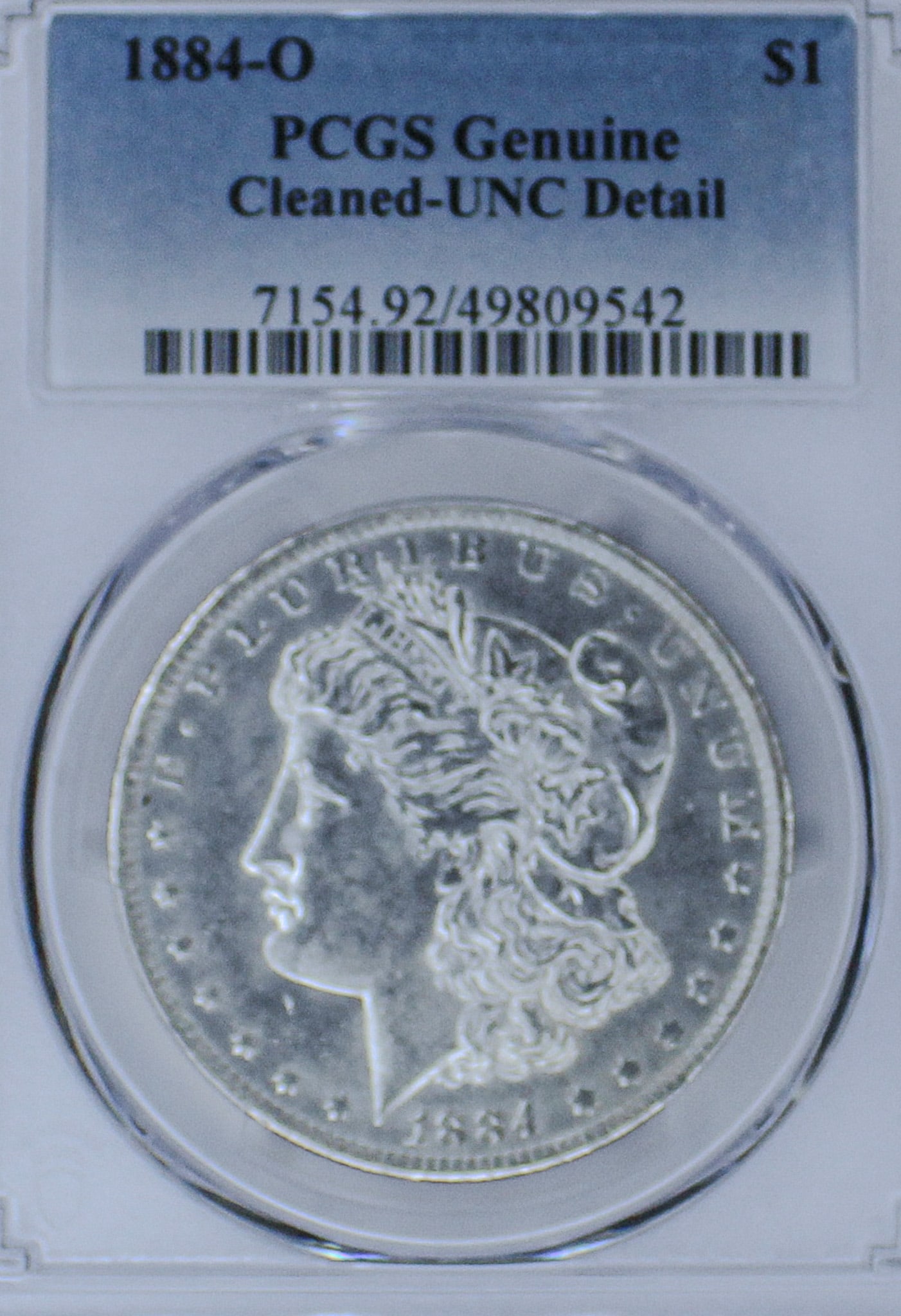 1884-O Morgan Silver Dollar Genuine Cleaned-UNC Detail (1 of 2)