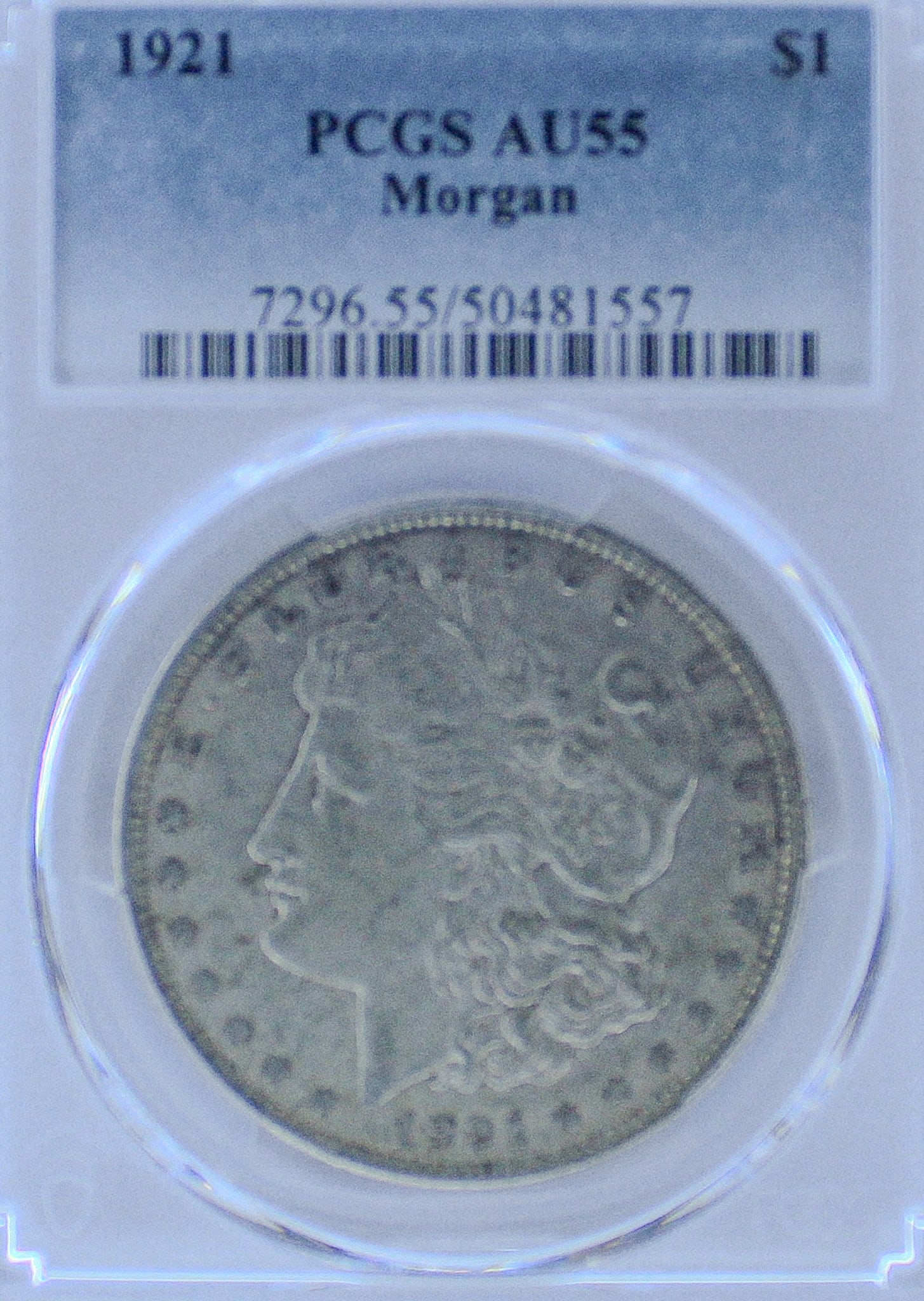 1921 Morgan Silver Dollar AU55 Morgan: The 1921 Morgan Silver Dollar is a stunning piece of American history and was professionally graded by PCGS, Professional Coin Grading Service, as AU55 Morgan. T