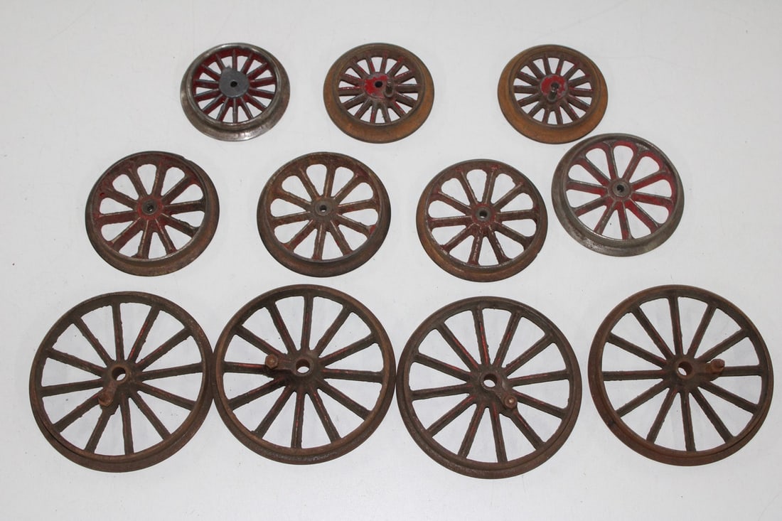 Old large locomotive and wagon wheels (1 of 1)