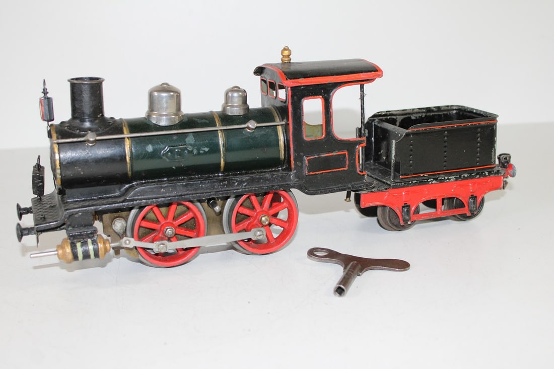 Marklin track 1 antique steam locomotive: Marklin track 1 antique steam locomotive clockwork intact, with clockwork key, one lamp missing, LF repaired, cylinder uel, used, Z 3+