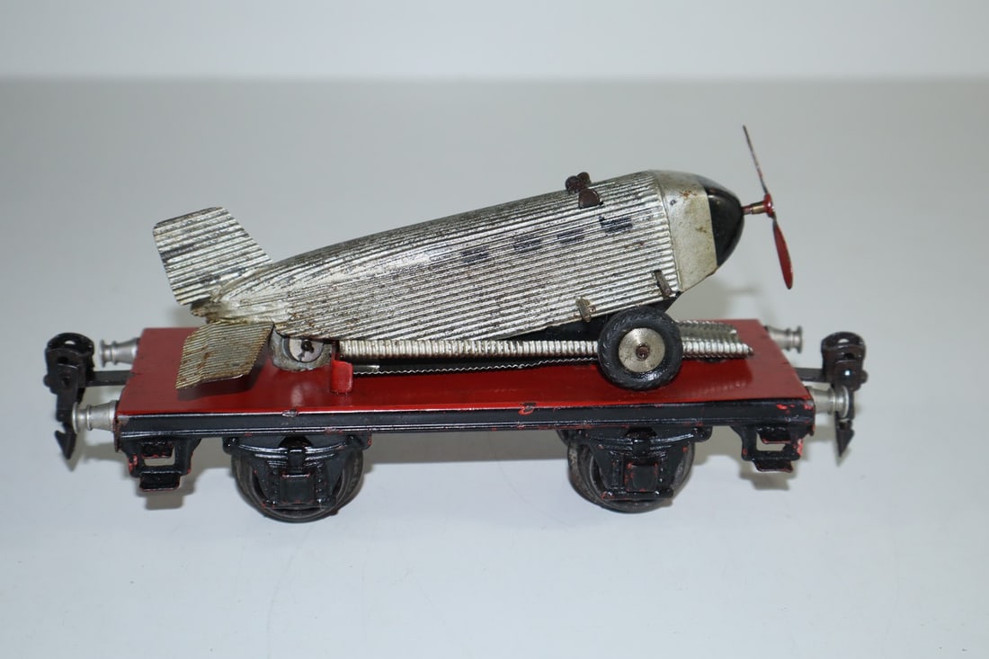 Marklin 0-gauge platform wagon with JU aircraft 1708: Marklin 0-gauge platform wagon with JU aircraft 1708 used, aircraft Z 3+, wagon Z 2-