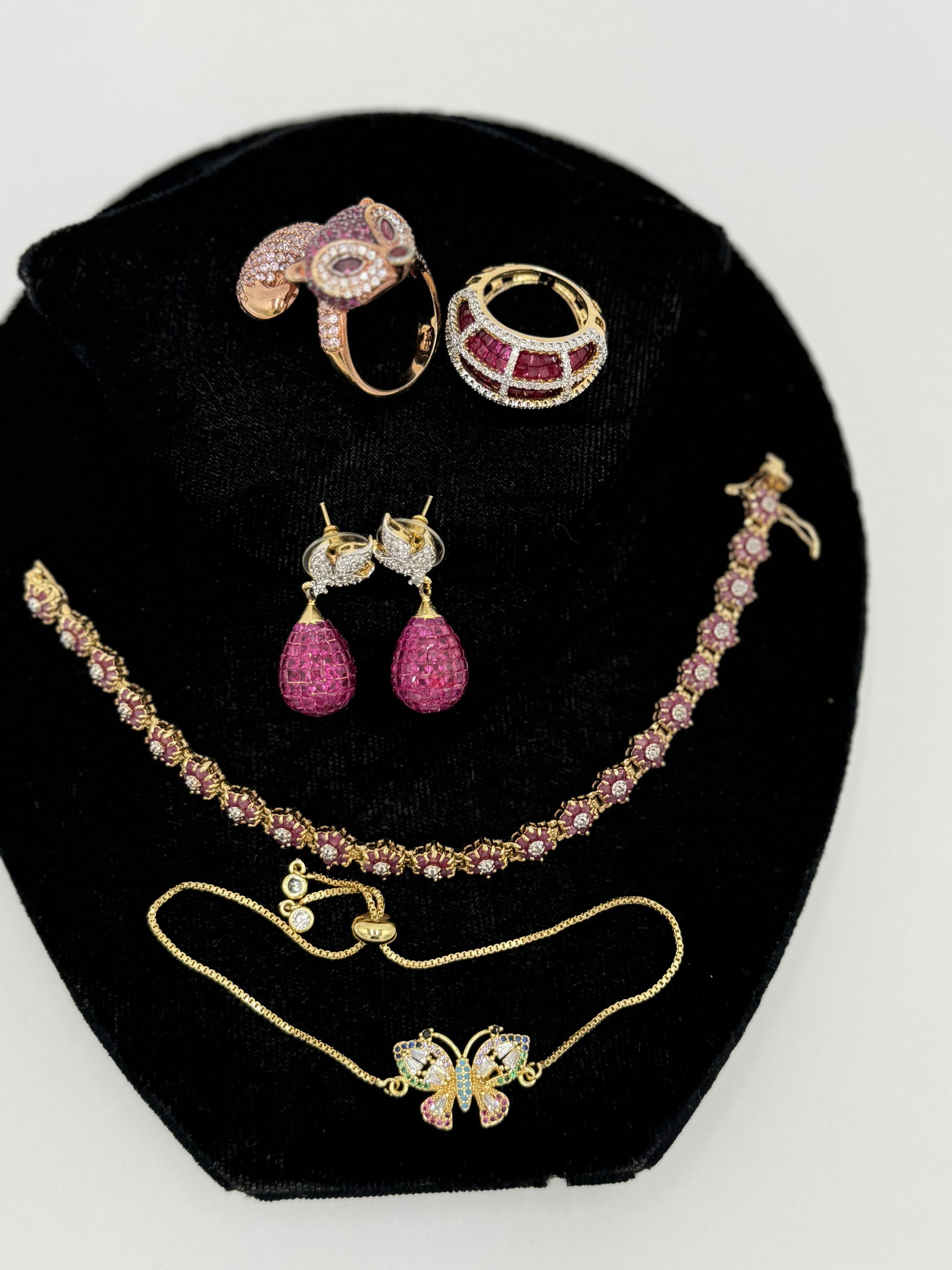 Fun costume jewelry lot with faux rubies earrings, bracelets, rings (1 of 6)