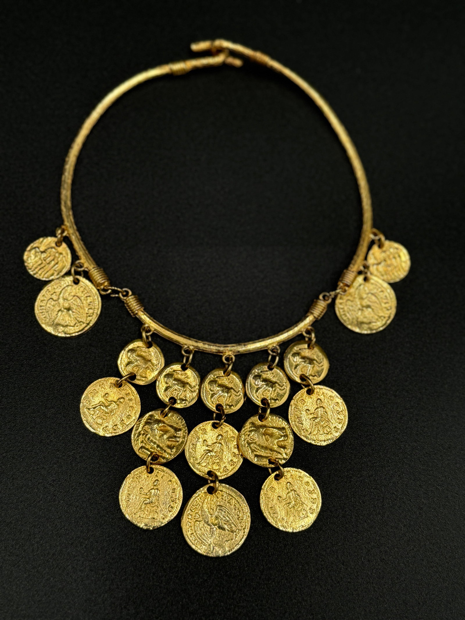 Gorgeous vintage Ancient Greco-Roman Gold-Tone Coin choker: Gorgeous vintage Ancient Greco-Roman Gold-Tone Coin choker. Approximately 14” long, with 3” coin drop. In good condition. See pictures for more details as they are the best description. WE