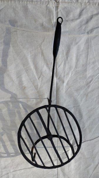 Wrought Iron Turning Trivet and Kettle Trivet: 10 1/4" surface x 23" with handle turning trivet, 7" h x 17 1/2" at handle kettle trivet, shipping available