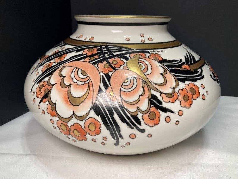 Limoges Art Deco Vase: Artist signed Bac. Gold gilt and hand painted with floral motif. Measures 7 3/8"T x 12"W. With loss to gilt on rim and normal age-appropriate wear. Shipping Available.