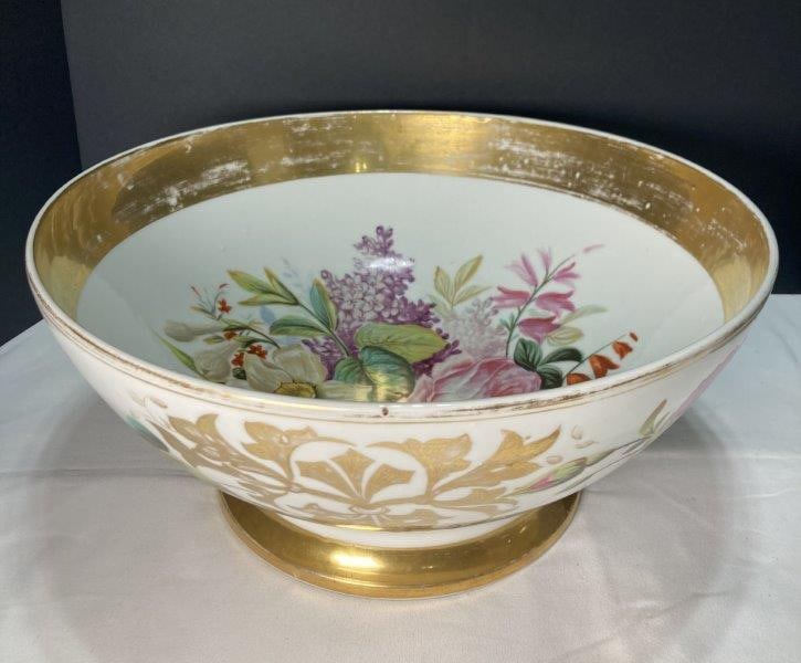 Large Old Paris Decorated Punch Bowl: Gilt with floral decoration around the bowl with a floral bouquet in the center of the bowl. With loss to gilt on rim and normal age-appropriate wear. Shipping Available.