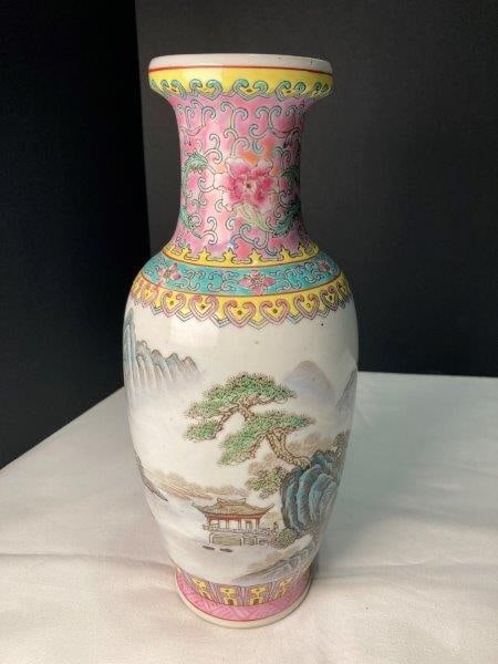 Chinese Porcelain Vase with Landscape and Poem: 20th Century, red mark, mountains in background, poem on the side. Measures 10'' x 4''. Very good condition. Shipping Available.