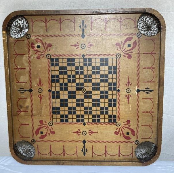 Antique Carrom Wooden Game Board: Double-sided stenciled game board. Style "E", No. 1 Archarena. Measures 28 1/2" square. With wear appropriate to age. Shipping Available.
