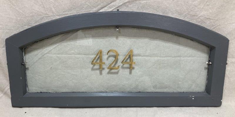 Transom Window from Woolworth Store: Woolworth store was located in Milwaukee, WI. With gray trim and gold numbering. Measures 14 3/4"T x 33"W. In good condition. Shipping Available.