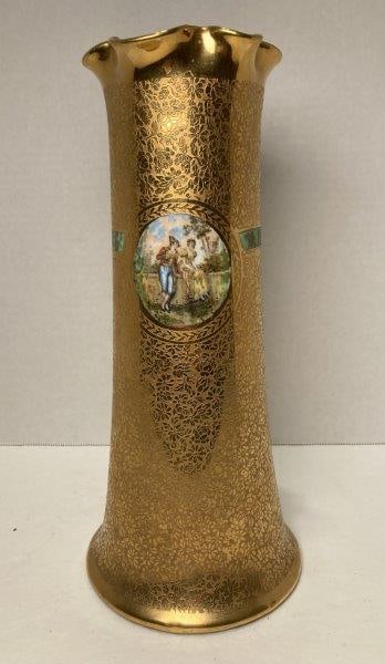 Osborne Gold Encrusted Vase: With ruffled edge and hand colored scenic transfers interior and exterior. Encrusted in 22k gold. Stamped on bottom. Tapered. Measures 10 3/4"T x 5" diameter at base. In good condition. Shipping Avail