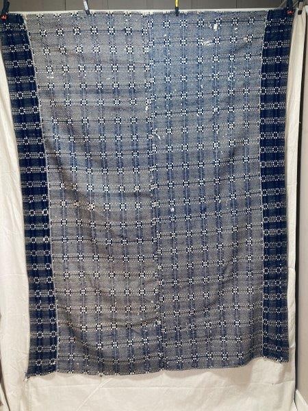 Blue and White Overshot Coverlet: Measures 69" x 87". With wear to stitching. Shipping available.