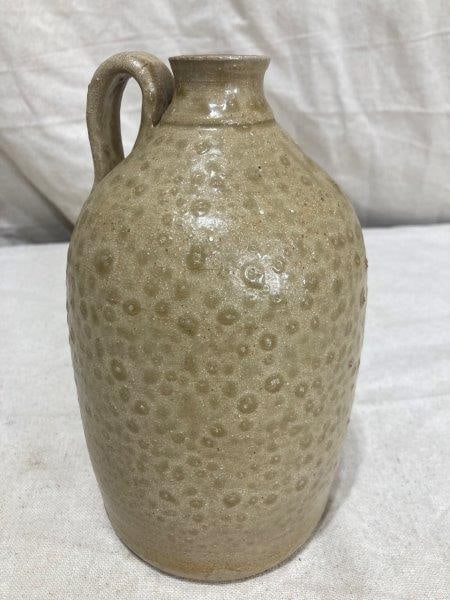 Stoneware Jug: Signed and dated 2012.Salt glaze. Measures 8 1/2''H x 4'' in diameter. In good condition. Shipping Available.