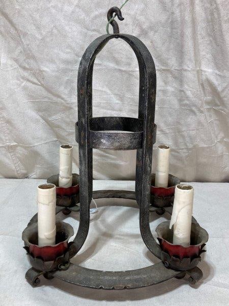 Wrought Iron Four-Light Chandelier: This exceptional American wrought iron chandelier features a classic four-light design, with a birdcage-style central structure. Measures 22''T x 17 1/2'' in diameter.