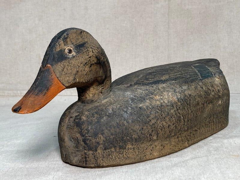 Mallard Hen Decoy by Victor: Featuring weathered paint and classic form, 20th Century. Measures approx. 16'' X 6''. Good condition with wear to the paint. Shipping Available.