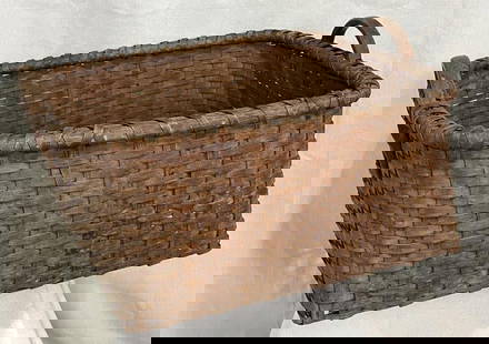 Large Splint Oak Gathering Basket: Impressive large gathering basket crafted from splint oak, showcasing a warm, weathered patina and sturdy construction. Measures approx. 12''H x 21 3/4''W x 22 5/8''D. Good condition with slight loss